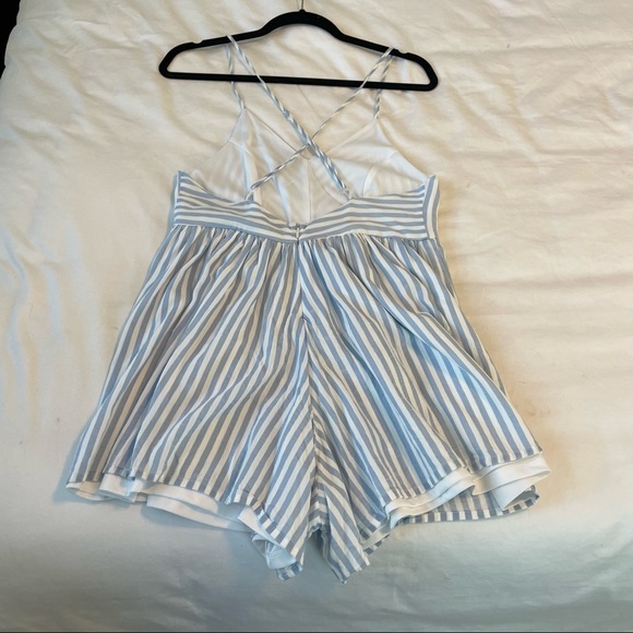 Francesca’s Blue and White Romper With Criss Cross Back - Picture 2 of 4